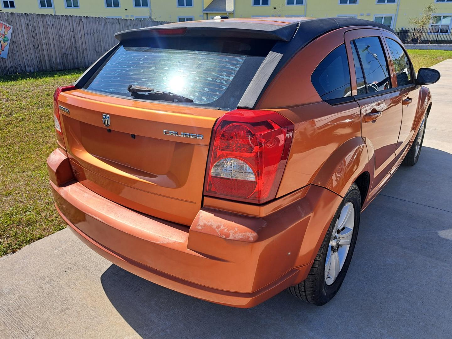 2011 ORANGE Dodge Caliber Mainstreet (1B3CB3HA2BD) with an 2.0L L4 DOHC 16V engine, Continuously Variable Transmission transmission, located at 1181 Aurora Rd, Melbourne, FL, 32935, (321) 241-1100, 28.132914, -80.639175 - Photo#2